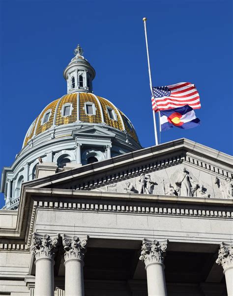 Why are flags in Colorado at half-staff?